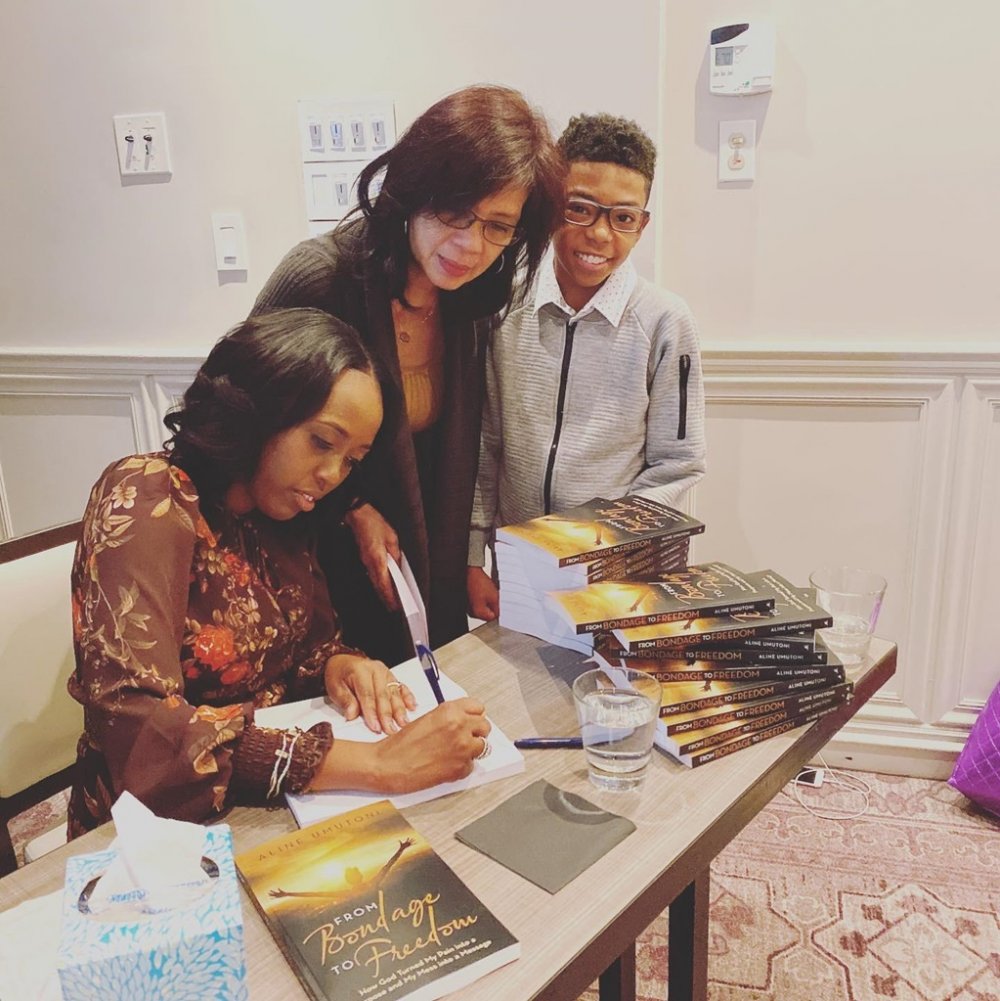 Umutoni showcasing her book in the United States of America.