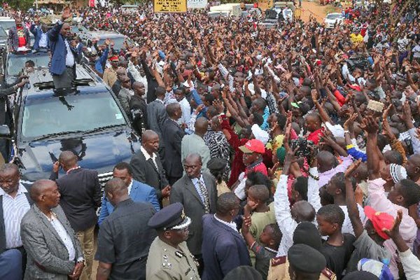 President Uhuru Kenyatta and Deputy President William Ruto address residents of Mwingi in Kitui on June 10, 2016.