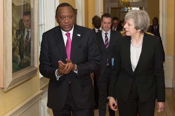 President Uhuru Kenyatta with UK Prime Minister Theresa May in London on May 11, 2017.
