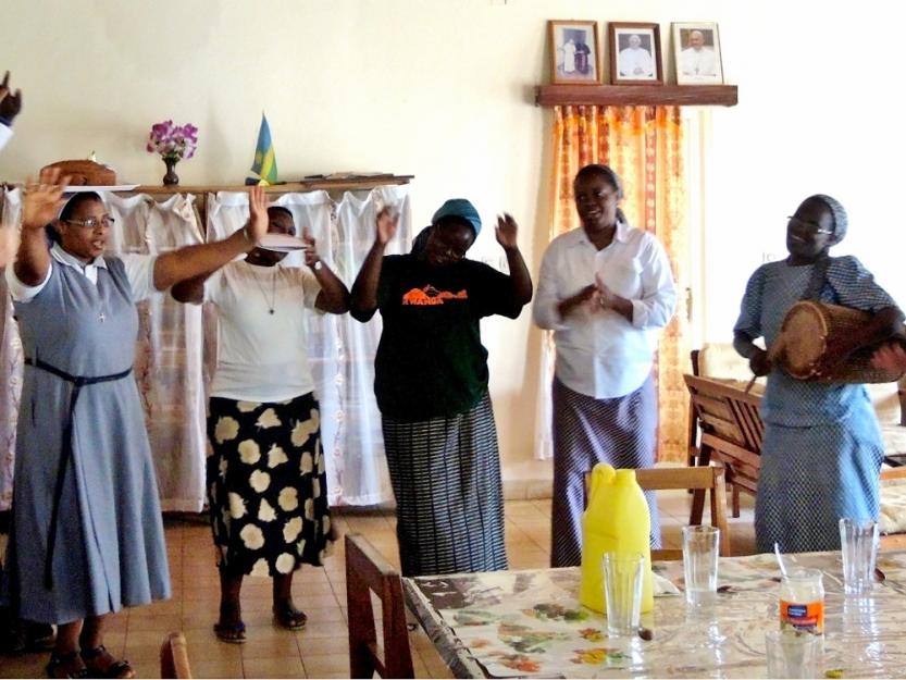 Oblate Sisters of the Assumption in Kigali sing a traditional song for guests. Sr. Claudine Uwamariya, who works with street children, is on the left. (GSR photo / Melanie Lidman)