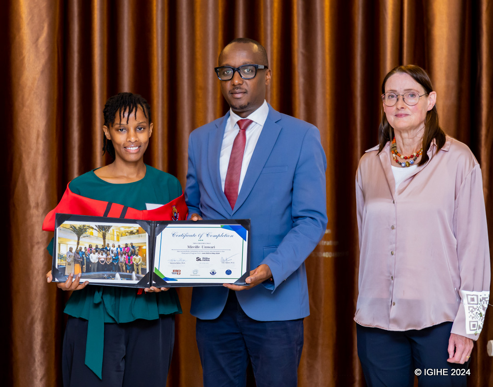 Zipline employee, Umwari Mireille receiving her certificate.