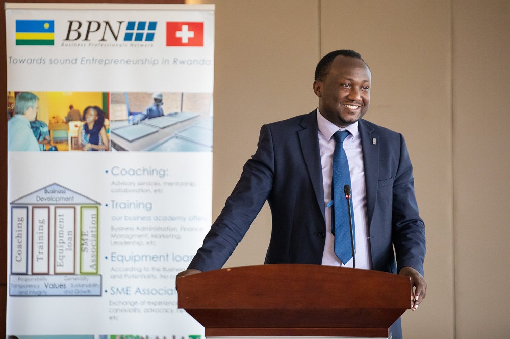 Faustin Mwambari, the Head of Employment Ecosystem Policy and Strategy Department in the Ministry of Public Service and Labour speaking at the event. 