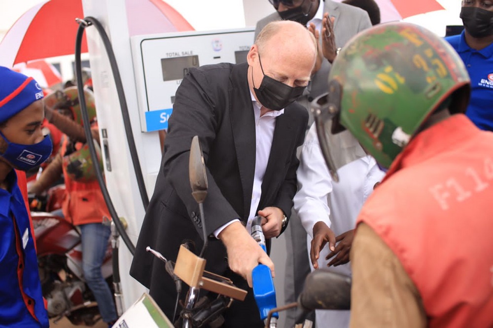 Mr. Stan Mittelman, the CEO of Vivo Energy Group refilling a motorcycle at the newly launched service station in Nyakabanda.  