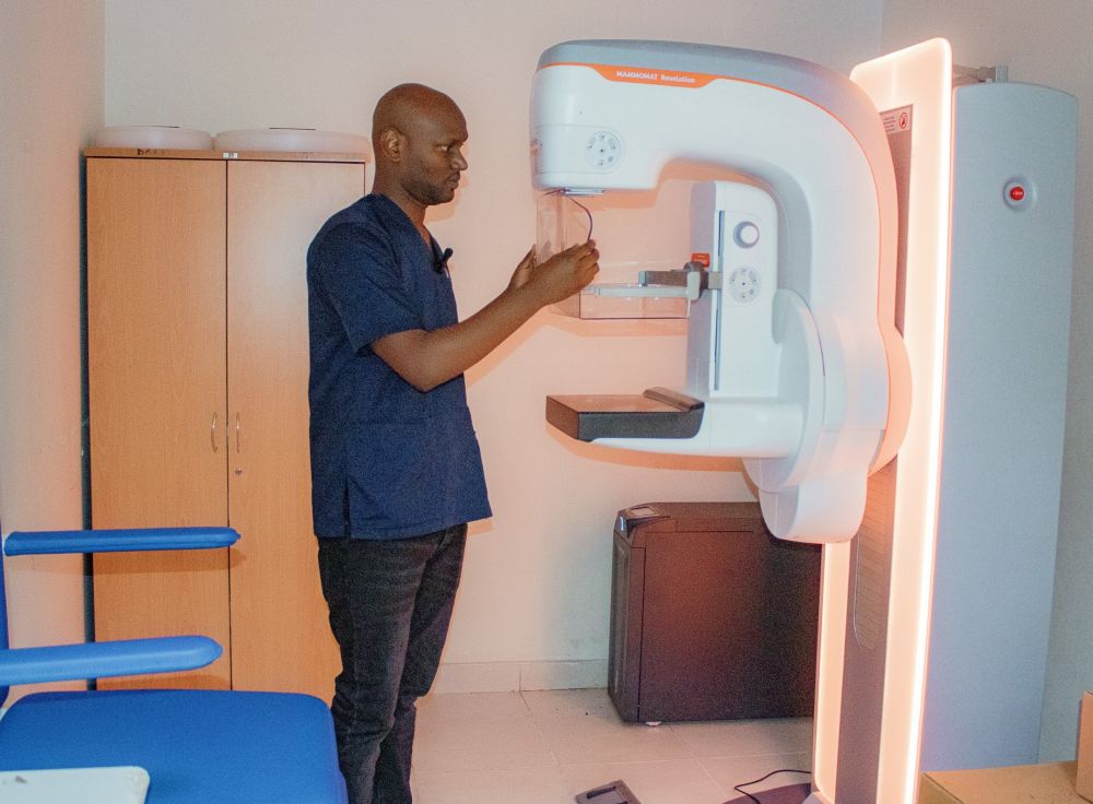 A CHUB doctor shows how the machine used to detect breast cancer functions.