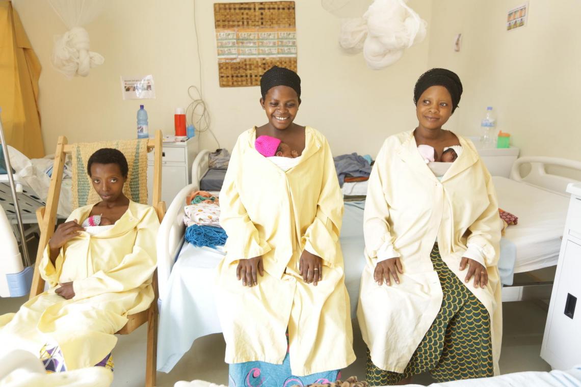 Jemimah, right, sits with two other mothers in the Kangaroo Care room. Gahini Hospital did not always have the best care, but with more medical equipment and better trained doctors through the clinical mentorship programme, mothers like Jemimah feel safer and happier giving birth here.