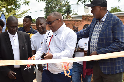 Kicukiro District Deputy Mayor, Baingana Emmanuel at the centre, officially launching Mount Kigali Hostel Swimming pool facility.