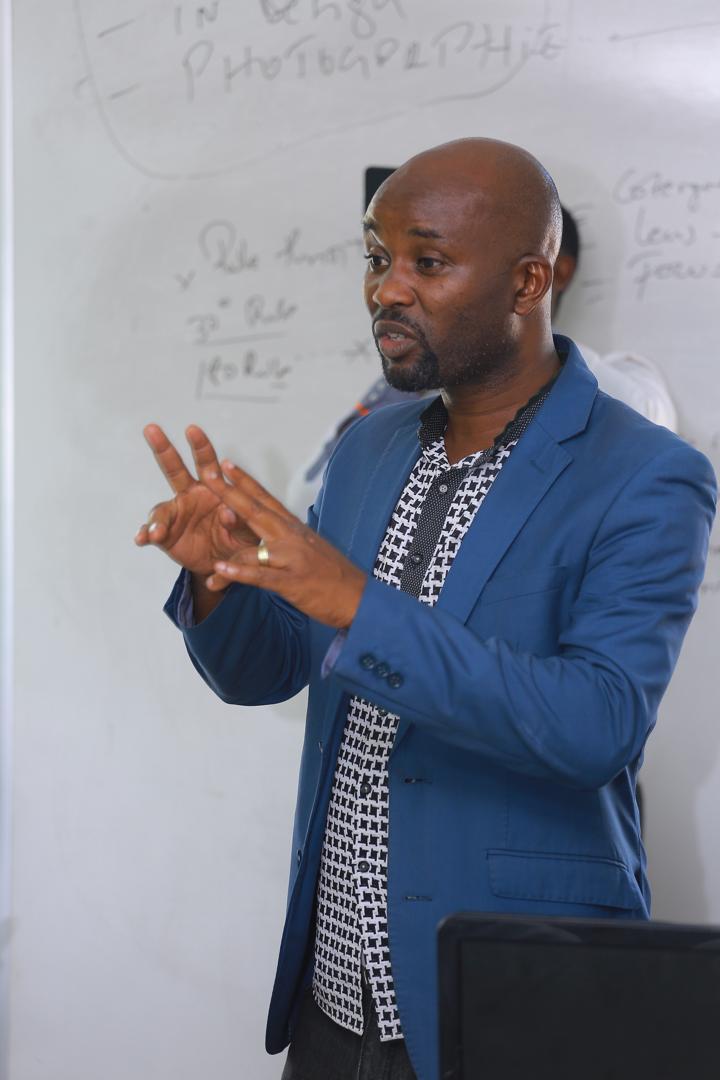 Jilly Claude Uwizeyimana, the director of IBTC Film School speaks at the training.