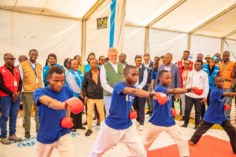 Congolese youth at Nkamira Transit Camp demonstrate martial skills.