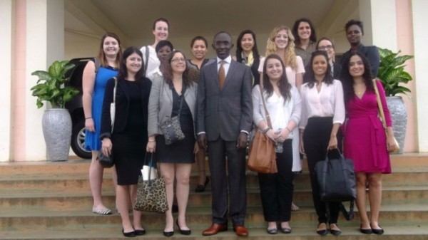 New York University students pose for a photo with the President of Supreme Court ,Prof.Sam Rugege