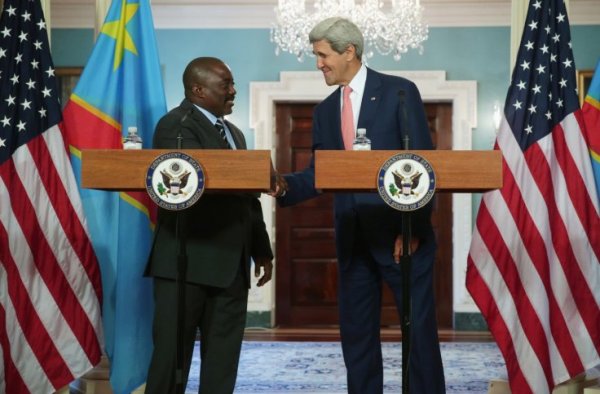 President of the Democratic Republic of Congo Joseph Kabila (L) and US Secretary of State John Kerry shake hands before a bilateral meeting during the US-Africa Leaders' Summit in August 2014 in Washington, DC