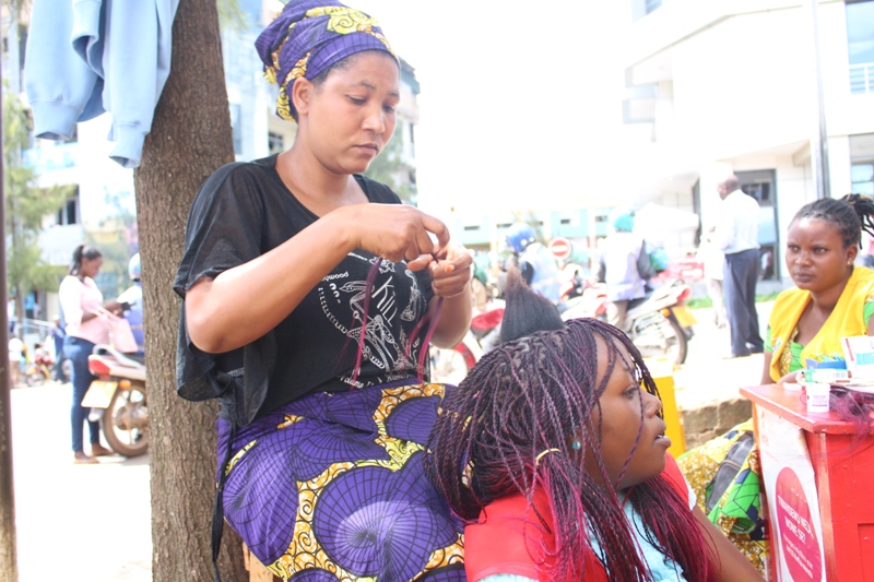 Uwingabire Clementine serving a client