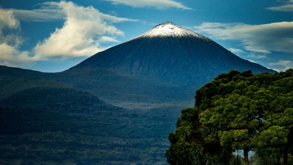 The view of National Volcanoes Park, a home of Mountain Gorillas that attract many tourists.