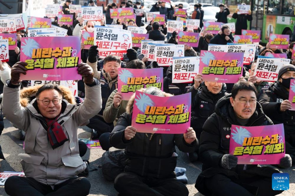 Protesters in favor of the impeachment of South Korean President Yoon Suk-yeol shout slogans "Immediate Arrest" during a rally near the presidential residence in Seoul, South Korea, Jan. 12, 2025. South Korean President Yoon Suk-yeol will not attend the first hearing of his impeachment trial, scheduled for Tuesday, for safety concerns, Yoon's defense counsel said Sunday. (Photo by Jun Hyosang/Xinhua)
