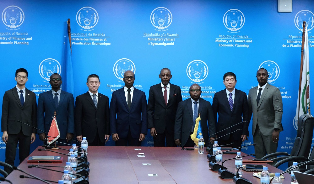 Rwandan and Chinese officials during the signing ceremony. The loan will be repaid over a period of 13.5 years, with a grace period of six and a half years before repayments begin. It carries an annual interest rate of 2 per cent.