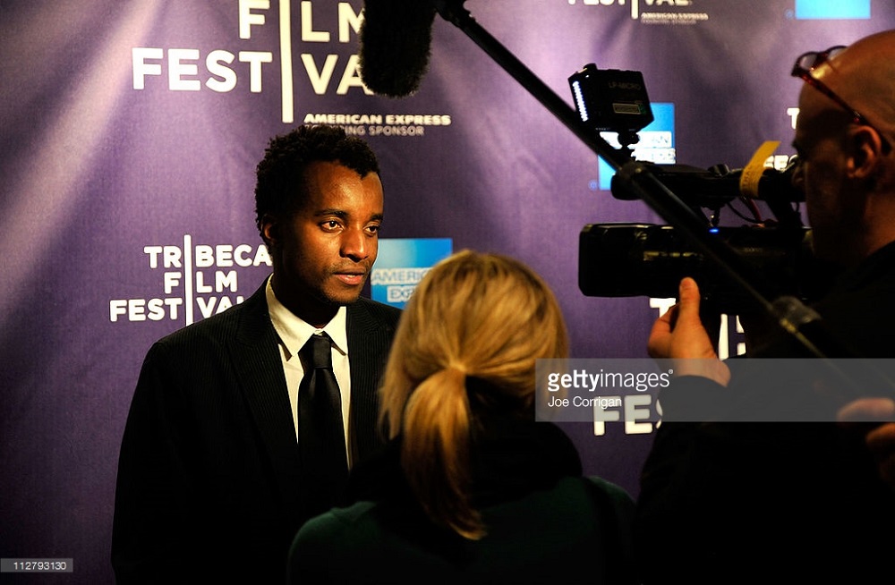 An established Rwandan director, writer, and producer, Kivu Ruhorahoza's career has skyrocketed since his collaboration with Filmamker Eric Kabera in 2004.