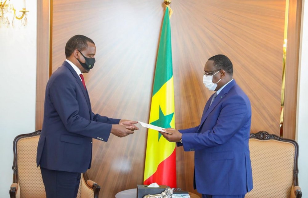Amb. Karabaranga presenting credentials to Senegal President, Macky Sall.   