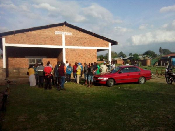Meat consumers waiting at the closed butchery.