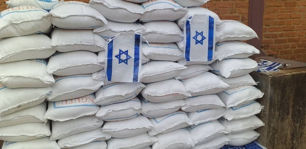 The embassy of Israel led by Dr. Ron Adam, Ambassador of Israel to Rwanda donated 4 tons of beans, rice and maize flour worth Rwf 3 million.