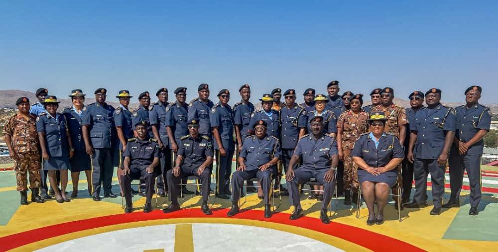 The Inspector General of Police (IGP) Dan Munyuza in a group photo with Namibian Police officers. 
