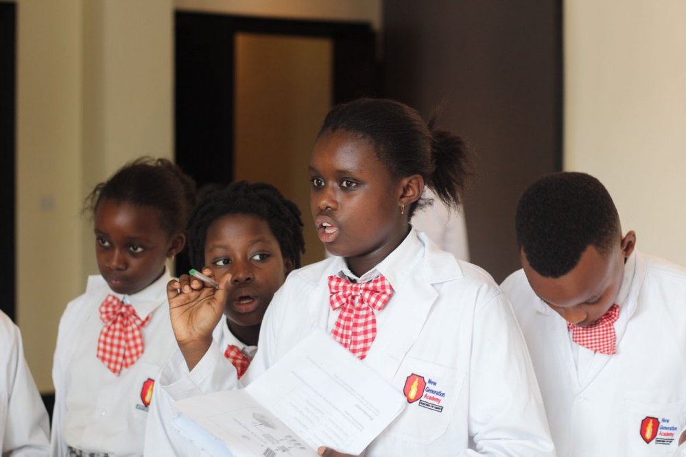 Children from New Generation Academy pitching their project. 