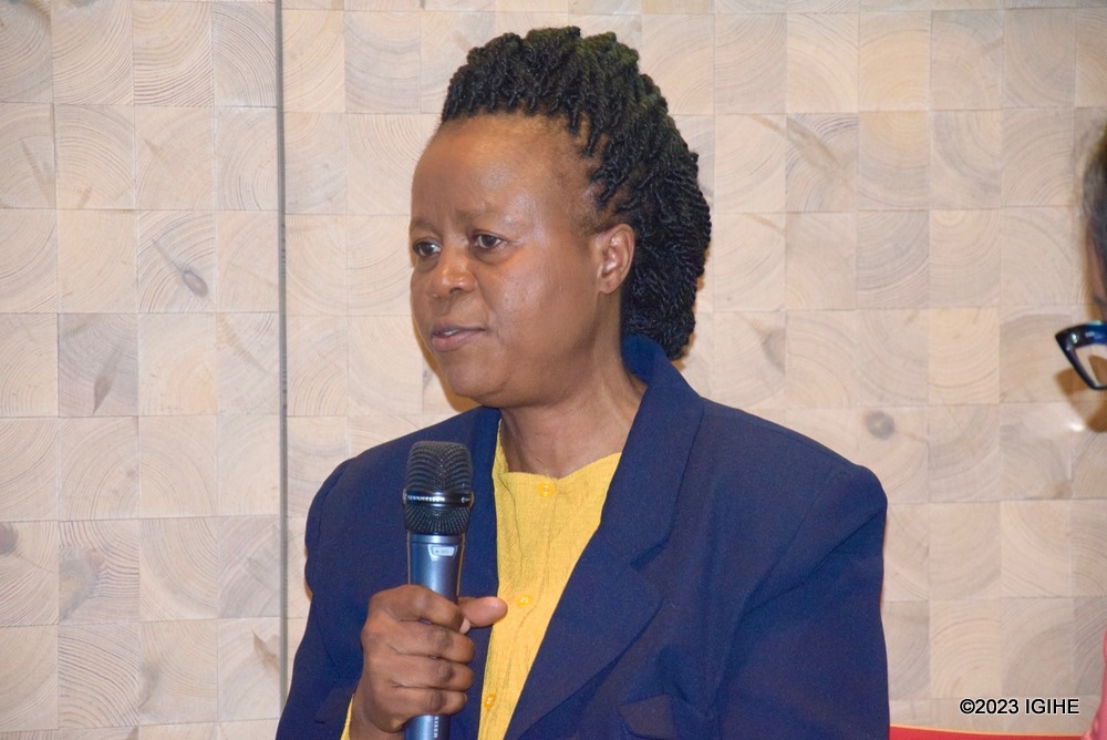 Marie-Louise Murekatete delivering a talk.  