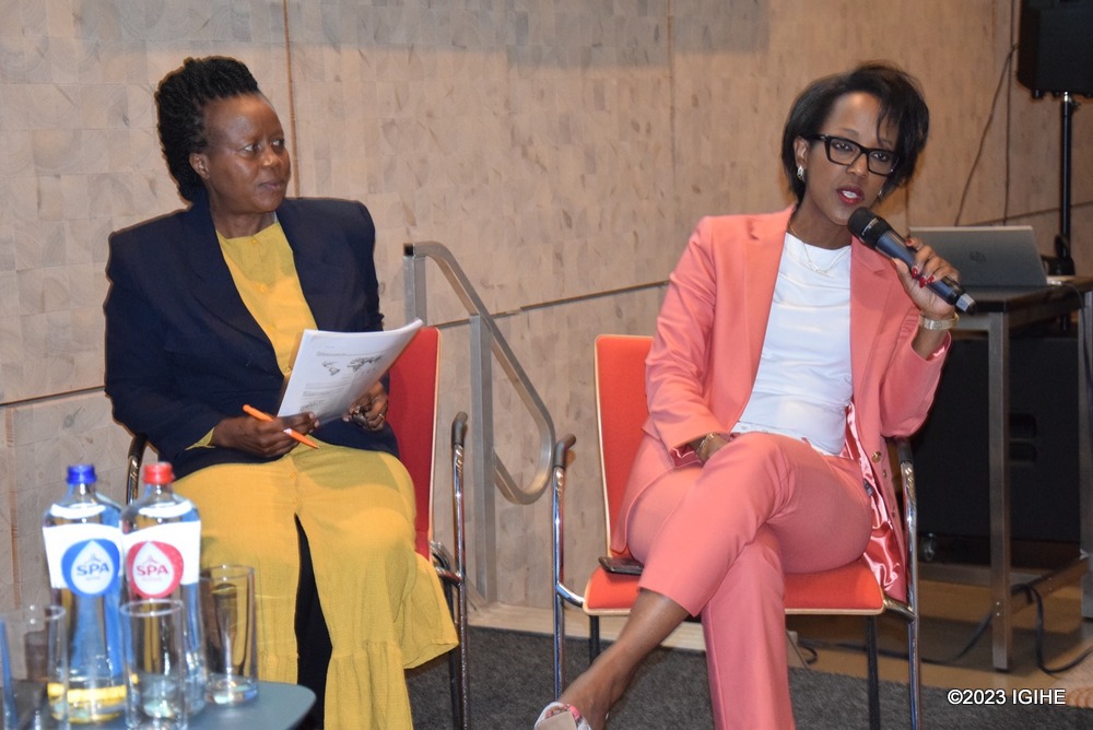 Murekatete (left) and Coco Rulinda delivering talks on what has been done to empower women in Rwanda.  