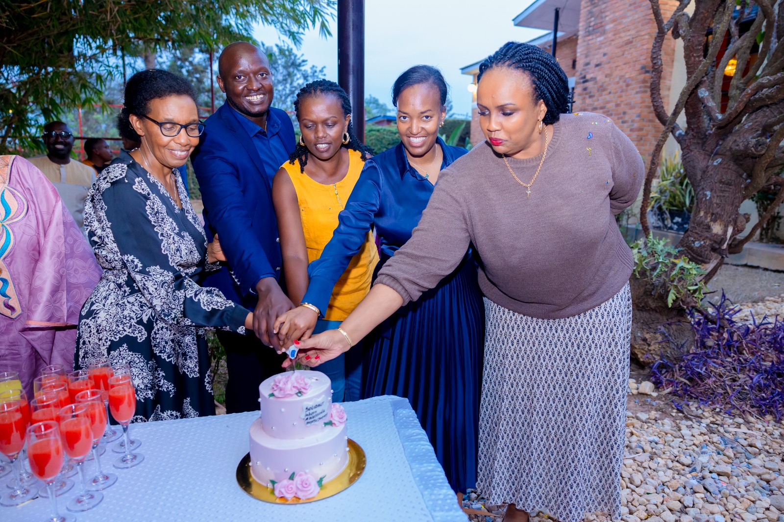 Attendees cut cake to celebrate the launch of the Solidarity in Action (SOLIDACT) Foundation on August 15, 2024.