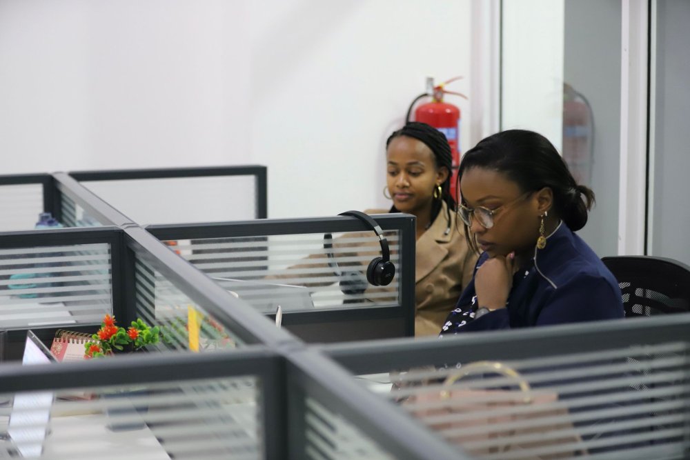 Some of Manzi Finance Ltd employees at work.