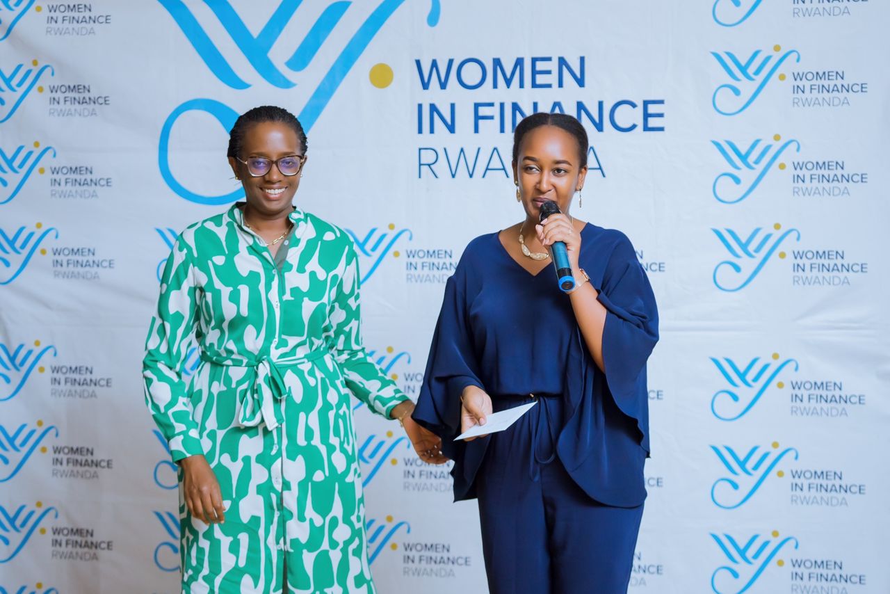 Diane Karusisi, CEO of the Bank of Kigali, presents tokens of appreciation to key partners for their unwavering support.