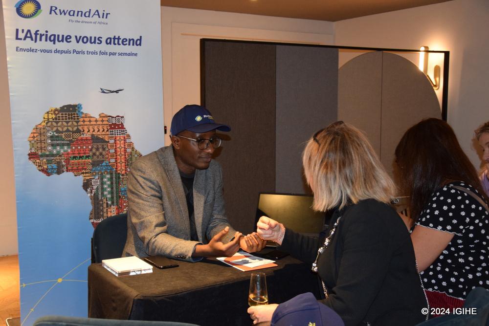 Deogratias Higiro, the country manager for RwandAir in Paris interacting with tourism stakeholders in Paris.