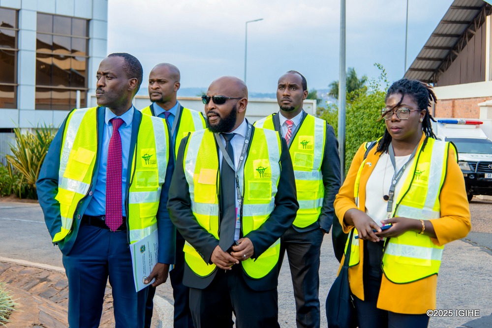 Rwandan officials awaiting the handover of Mbonyunkiza at Kigali International Airport.