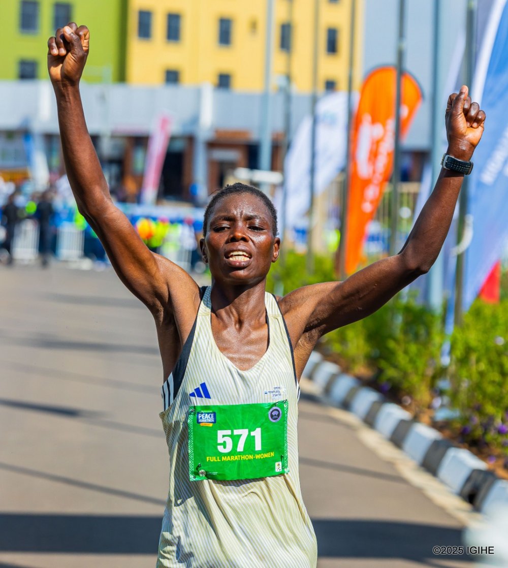 Kenya's Teresia Kwamboka Omosa clinching gold in the women’s race.