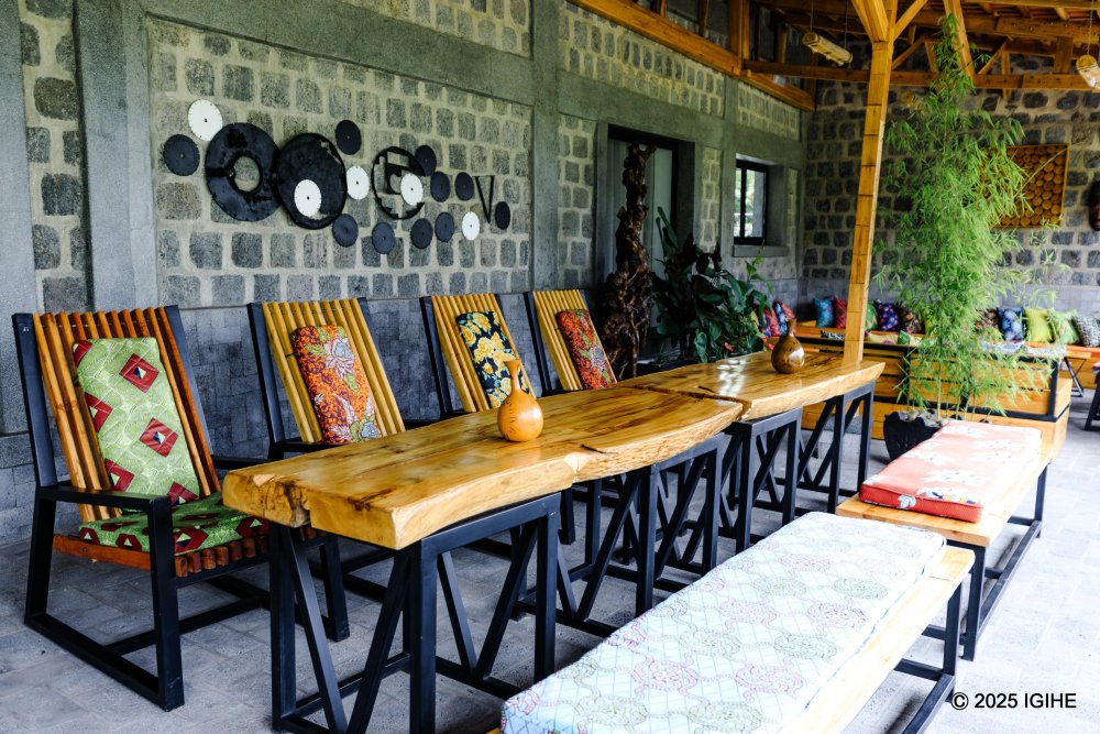 The outdoor lounge is set in a breezy, open-air environment.