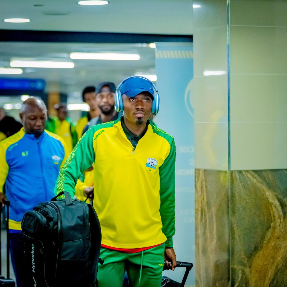 Amavubi captain Bizimana Djihad leads his teammates as they arrive in South Africa.