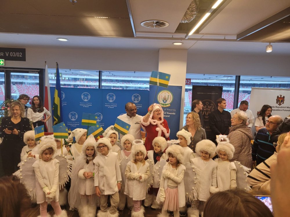 Preschool children arrived with Rwandan flags and sang Christmas carols in Kinyarwanda.