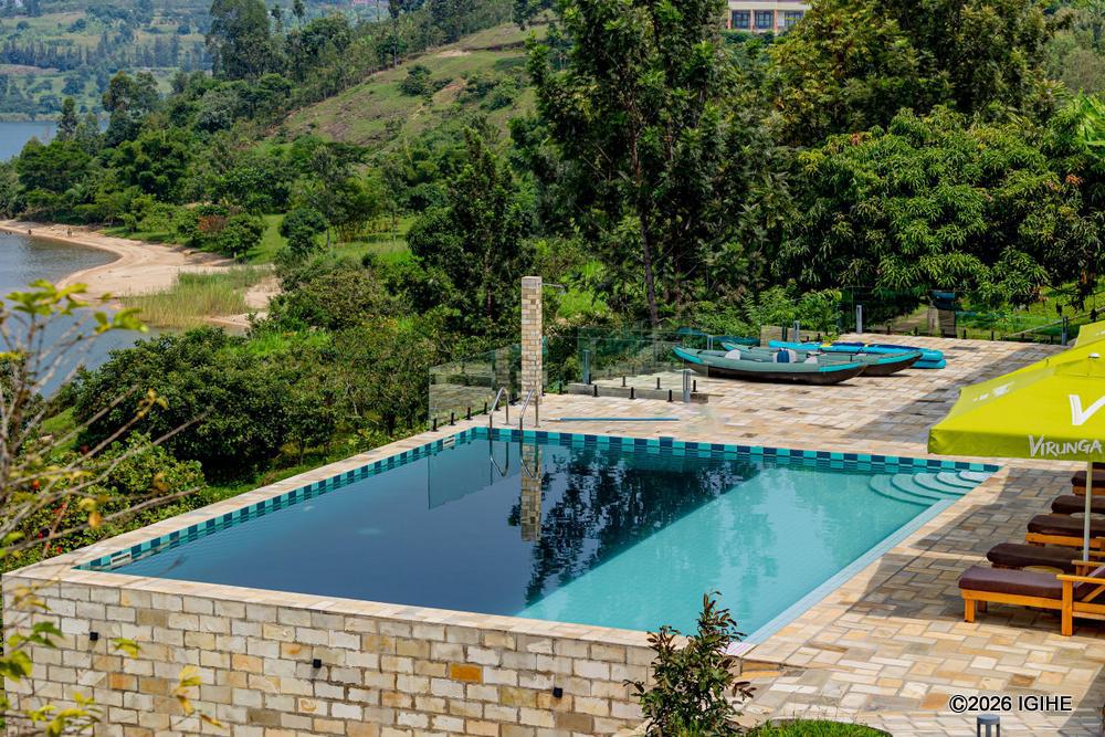 From the Umutuzo Lodge swimming pool, guests enjoy a close view of Lake Kivu.