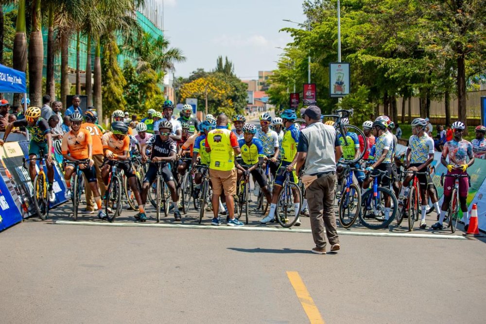 Riders prepare to start the race outside Amahoro Stadium.