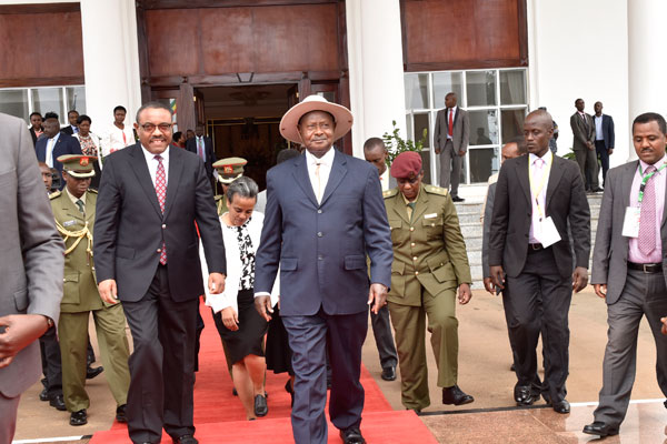President Museveni receives Ethiopia’s Prime Minister Hailemariam Desalegn upon arrival at State House Entebbe recently. A court in Ethiopia on Tuesday found a former opposition spokesman guilty of encouraging terrorism with a series of anti-government Facebook posts.