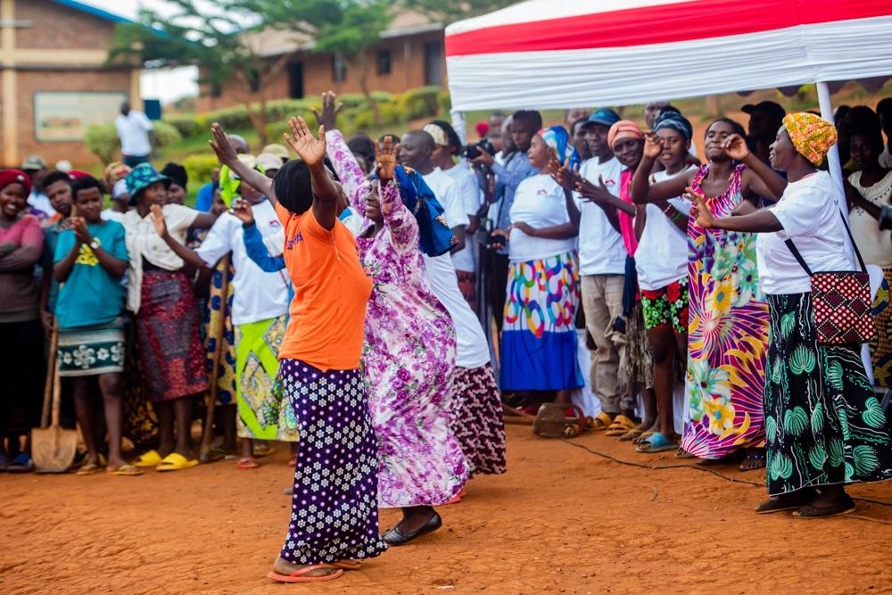 Residents dancing after the tree planting exercise.