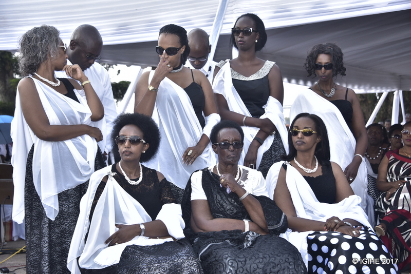 Speciose Mukabayojo (sitting in the middle, surrounded by her daughters) attended the burial of her brother, King Kigeli V Ndahindurwa in 2017.